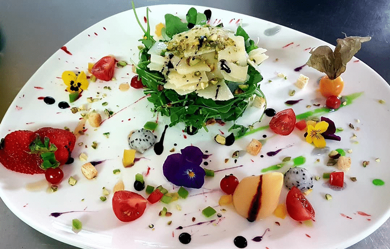 Ensalada de rúcula en Restaurante Cas Carreter